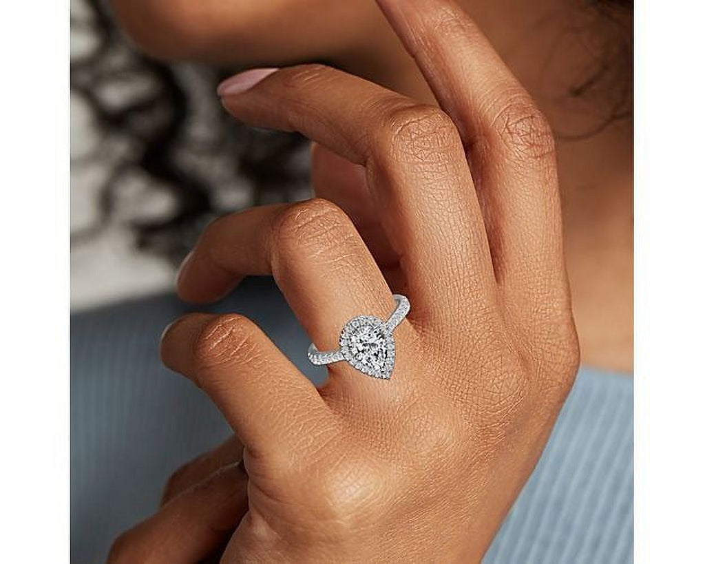 14K White Gold Pear Cut Diamond Solitaire Engagement Ring Size 7 M101169